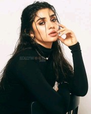 Sexy Krithi Shetty in a Black Dress Wet Look Photos 02