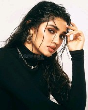 Sexy Krithi Shetty in a Black Dress Wet Look Photos 05