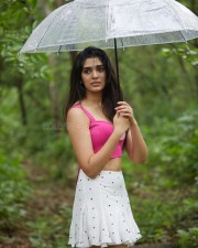 Sexy Krithi Shetty in a Pink Noodle Strap Top and White Mini Skirt Photos 01
