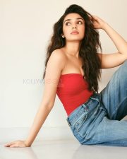 Sexy Krithi Shetty in a Red Strapless Top and Denim Jeans Pictures 01