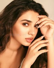 Sexy Krithi Shetty in a Red Strapless Top and Denim Jeans Pictures 03