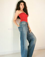 Sexy Krithi Shetty in a Red Strapless Top and Denim Jeans Pictures 05