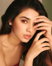 Sexy Krithi Shetty in a Red Strapless Top and Denim Jeans Pictures 07
