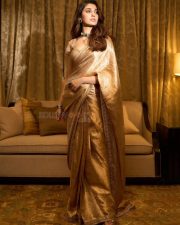 South Indian Actress Krithi Shetty in a Golden Saree with a Matching Designer Blouse Photos 02 South Indian Actress Krithi Shetty in a Golden Saree with a Matching Designer Blouse Photos 02
