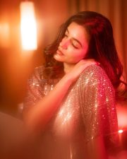 Sparkling Beauty Anju Kurian in a Shimmering Dress Photos 05