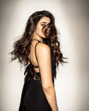 Striking Actress Krithi Shetty in a black sequined backless dress photos 05