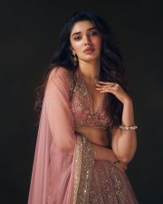 Striking Actress Krithi Shetty in a dusty rose embellished saree with gold jewelry photos 14