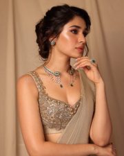 Stunning Krithi Shetty in a Golden Saree and Sleeveless Blouse Photos 05
