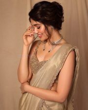 Stunning Krithi Shetty in a Golden Saree and Sleeveless Blouse Photos 09 Stunning Krithi Shetty in a Golden Saree and Sleeveless Blouse Photos 09