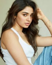Stunning Krithi Shetty in a White Tank Top and Blue Jeans Photos 02
