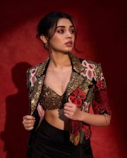 Stunningly Attractive Krithi Shetty in a Black Velvet Embroidered Crop Blazer with a Silk Embroidered Bustier and Thigh Slit Drape Skirt Photos 01