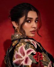 Stunningly Attractive Krithi Shetty in a Black Velvet Embroidered Crop Blazer with a Silk Embroidered Bustier and Thigh Slit Drape Skirt Photos 02