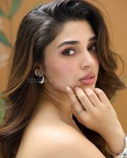 Stylish Krithi Shetty in a Black Strapless Mini Dress Pictures 03