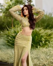 Stylish Krithi Shetty in a Shimmering Lime Green Co Ord Set with a Thigh Slit Skirt and High Neck Long Sleeve Top Photos 01