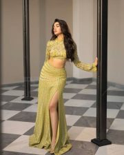 Stylish Krithi Shetty in a Shimmering Lime Green Co Ord Set with a Thigh Slit Skirt and High Neck Long Sleeve Top Photos 03