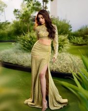 Stylish Krithi Shetty in a Shimmering Lime Green Co Ord Set with a Thigh Slit Skirt and High Neck Long Sleeve Top Photos 04