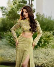 Stylish Krithi Shetty in a Shimmering Lime Green Co Ord Set with a Thigh Slit Skirt and High Neck Long Sleeve Top Photos 06