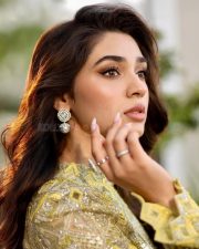 Stylish Krithi Shetty in a Shimmering Lime Green Co Ord Set with a Thigh Slit Skirt and High Neck Long Sleeve Top Photos 07