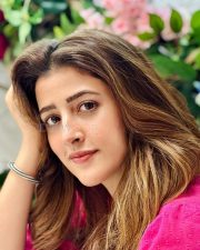 Stylish Nupur Sanon in a Pink Halter Neck Dress Photos 01