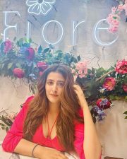 Stylish Nupur Sanon in a Pink Halter Neck Dress Photos 03