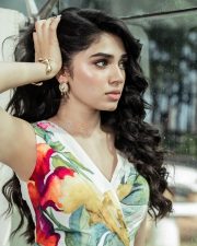 Stylish Telugu Beauty Krithi Shetty in a Multicolor Floral Cut Out Jumpsuit Photos 02