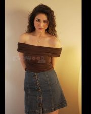 Stylish and Sexy Priyanka Jawalkar in a Brown Off Shoulder Top and Denim Skirt Pictures 02