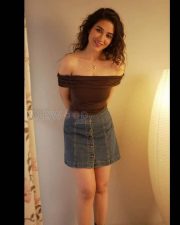 Stylish and Sexy Priyanka Jawalkar in a Brown Off Shoulder Top and Denim Skirt Pictures 03
