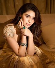 Telugu Actress Krithi Shetty in a Golden Embroidered Saree with Matching Blouse Pictures 02