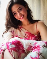 Vivacious Actress Priyanka Jawalkar in a White and Pink Floral Wrap Dress Photos 01