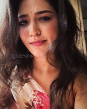 Vivacious Actress Priyanka Jawalkar in a White and Pink Floral Wrap Dress Photos 02