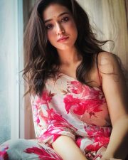 Vivacious Actress Priyanka Jawalkar in a White and Pink Floral Wrap Dress Photos 03