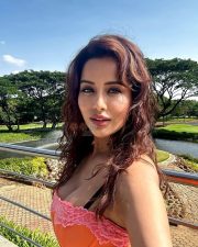 Vivacious Actress Raiza Wilson in a Orange Bodycon Dress Pink Lace Trim Photos 01