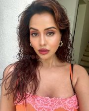 Vivacious Actress Raiza Wilson in a Orange Bodycon Dress Pink Lace Trim Photos 02
