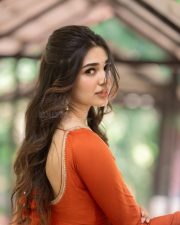 Winsome Actress Krithi Shetty in a Orange Embroidered Salwar Suit Photos 03