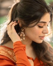 Winsome Actress Krithi Shetty in a Orange Embroidered Salwar Suit Photos 04