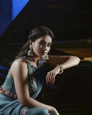 Actress Nivetha Pethuraj Sitting near a Piano Photo 01