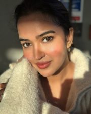 Actress Pujita Ponnada in a Off White Knit Sweater with a High Zip Up Collar Pictures 02