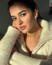 Actress Pujita Ponnada in a Off White Knit Sweater with a High Zip Up Collar Pictures 03