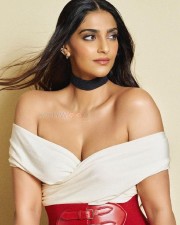 Actress Sonam Kapoor Showing Cleavage in a White Off Shoulder Dress Pictures 01