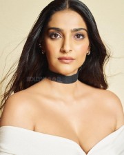 Actress Sonam Kapoor Showing Cleavage in a White Off Shoulder Dress Pictures 02