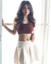 Alluring Actress Misha Narang in a Maroon Crop Top and White Pants Photos 07