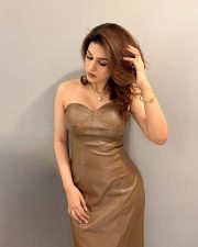 Arrdham Actress Shraddha Das in a Strapless Brown Faux Leather Midi Dress Pictures 03