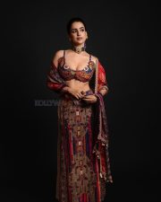 Attractive Sanya Malhotra in a Multi Colored Sleeveless Plunging Neckline Kamya Blouse with a Floor Length Skirt Pictures 02