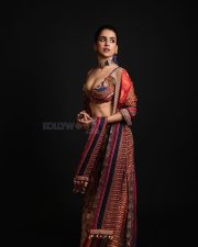 Attractive Sanya Malhotra in a Multi Colored Sleeveless Plunging Neckline Kamya Blouse with a Floor Length Skirt Pictures 03
