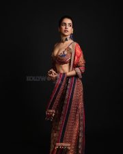 Attractive Sanya Malhotra in a Multi Colored Sleeveless Plunging Neckline Kamya Blouse with a Floor Length Skirt Pictures 03