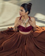 Beautiful Actress Shraddha Das in a Brown Lehenga Choli Photos 01