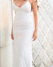 Beautiful Shraddha Das in a White Sleeveless and Backless Dress Photoshoot Pictures 02