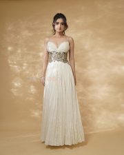 Bhartha Mahasayulaku Wignyapthi Heroine Ashika Ranganath in a Custom Ivory Gold Pleated Gown Pictures 01