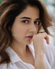 Captivating Ashika Ranganath in a White Shirt and Blue Denim Photos 07