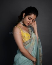 Dazzling Ashika Ranganath in a Yellow Sleeveless Blouse and Embroidered Saree Photos 02